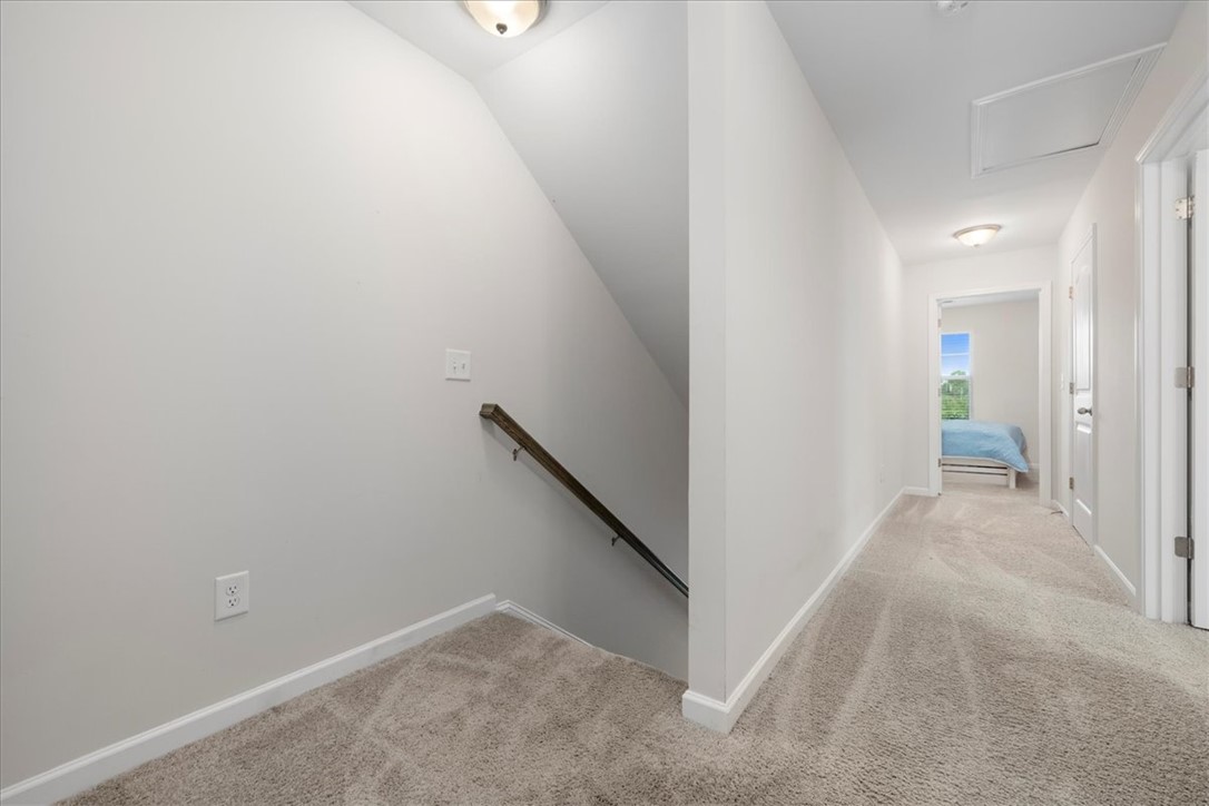 117 Adger Road Pendleton, SC 29670 - Photo 15 of 36 This spacious hallway features plush carpeting and leads to a bright bedroom.