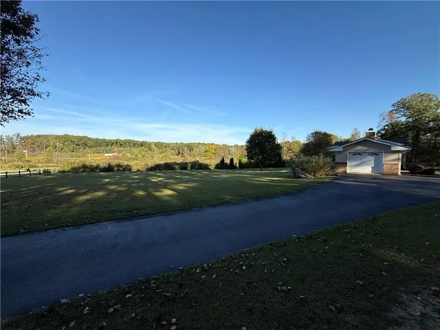 a view of yard with ocean view