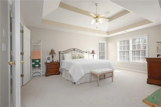 a view of a bathroom with a glass door shower