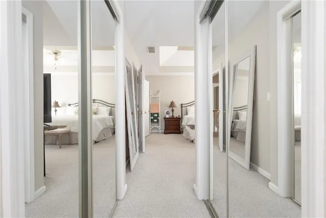 a bathroom with a shower sink and mirror