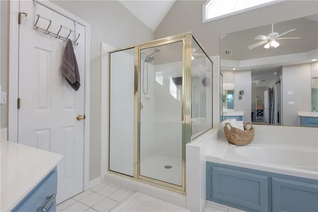 a room that has a closet and a mirror