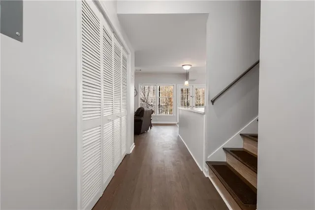 a view of a storage room with water heater and racks
