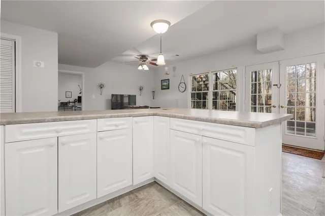 a view of balcony with wooden floor