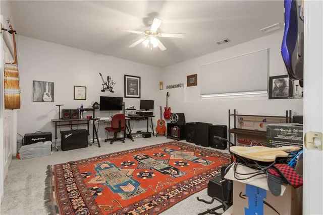 a view of a house with a small yard