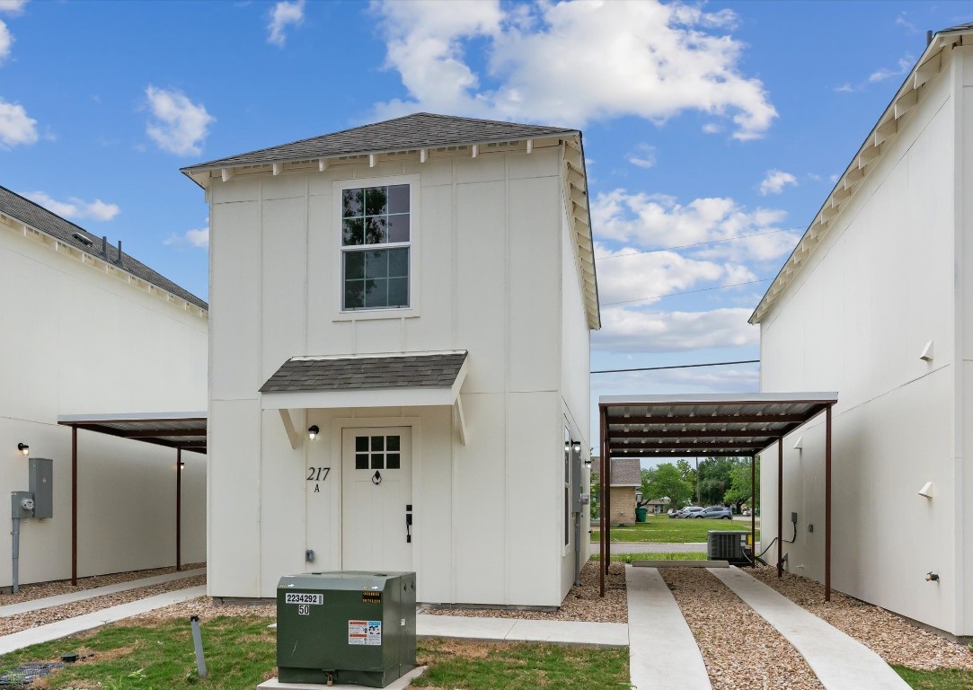 350 Debus Drive, Unit 217 Taylor, TX 76574 - Photo 1 of 1 a front view of a house with a yard