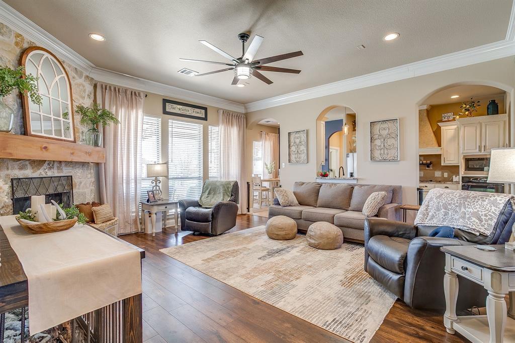 9409 County Road 915 Godley, TX 76044 - Photo 4 of 40 a living room with furniture fireplace and a large window