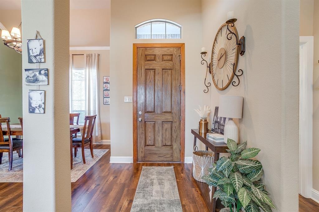 9409 County Road 915 Godley, TX 76044 - Photo 7 of 40 a view of an entryway with wooden floor
