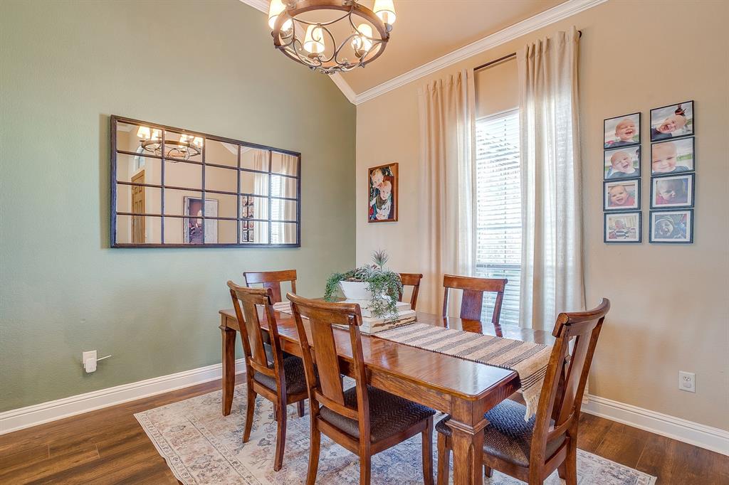 9409 County Road 915 Godley, TX 76044 - Photo 8 of 40 a view of a dining room with furniture window and wooden floor