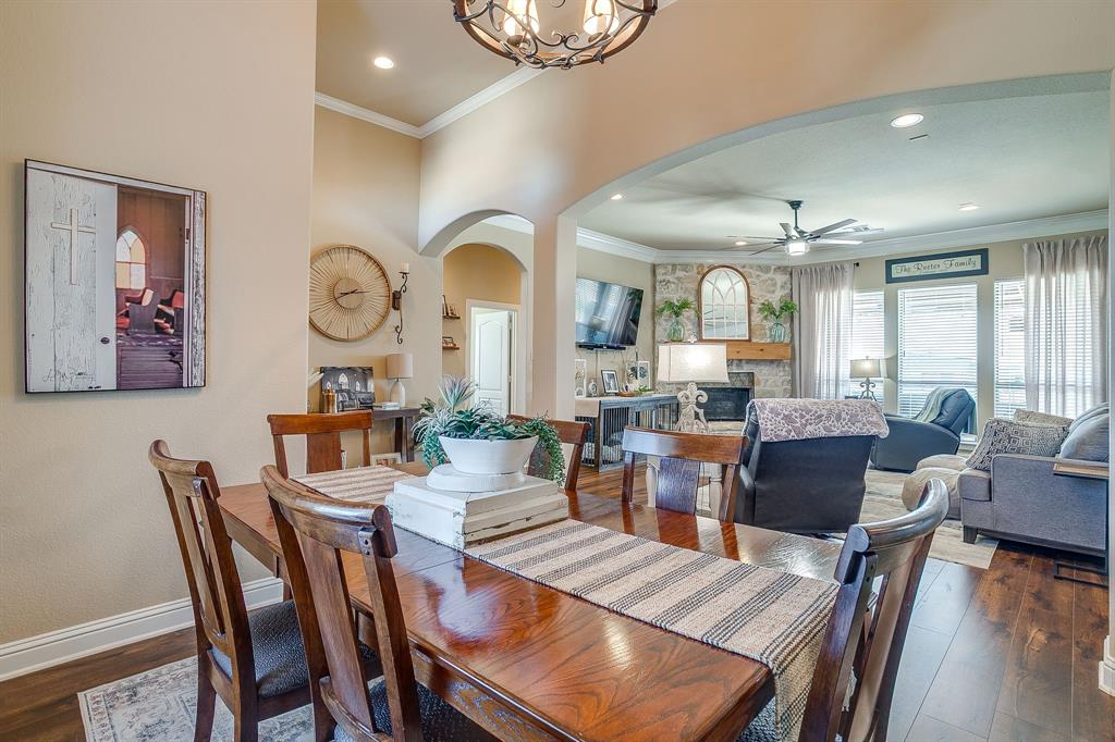 9409 County Road 915 Godley, TX 76044 - Photo 9 of 40 a view of a dining room with furniture window and wooden floor