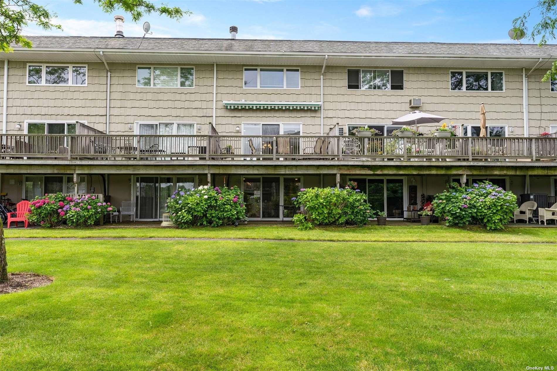 3029 Mitchell Road Westhampton Beach, NY 11978 - Photo 11 of 12 a house view with a garden space
