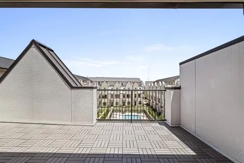 a view of a backyard of the house