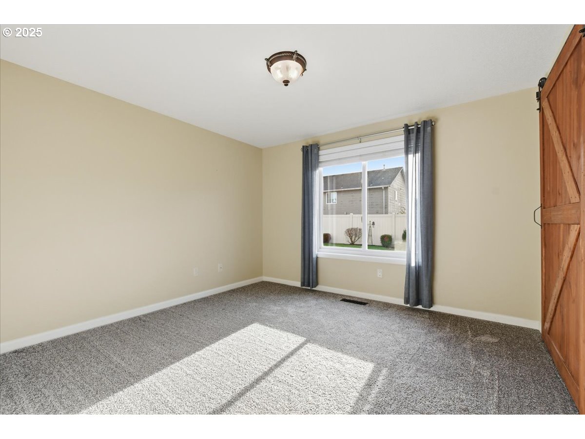 2519 Northwest 13th Street Battle Ground, WA 98604 - Photo 26 of 43 a view of an empty room with a window