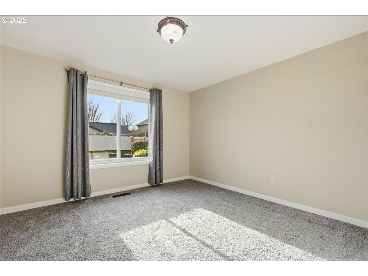 2519 Northwest 13th Street Battle Ground, WA 98604 - Photo 28 of 43 a view of an empty room with a window