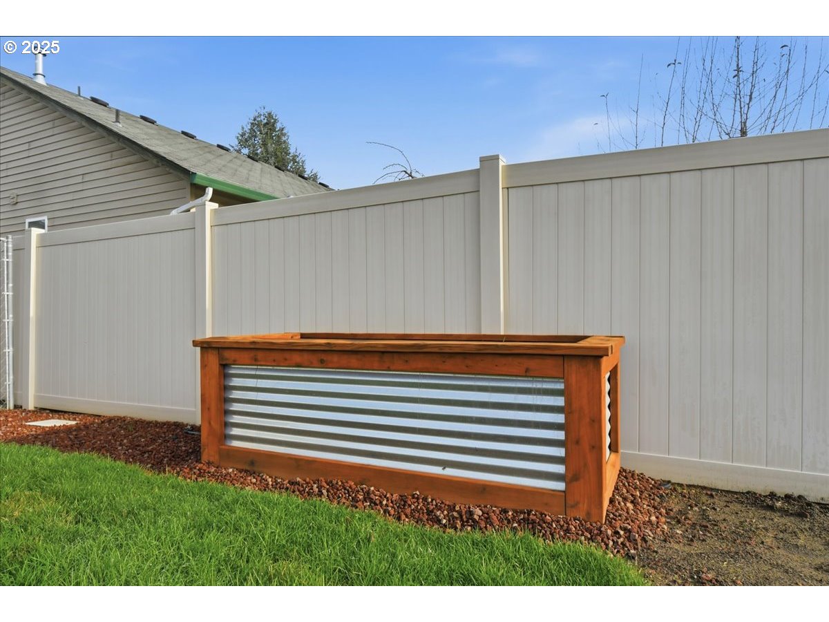 2519 Northwest 13th Street Battle Ground, WA 98604 - Photo 35 of 43 a view of a room with a wooden fence