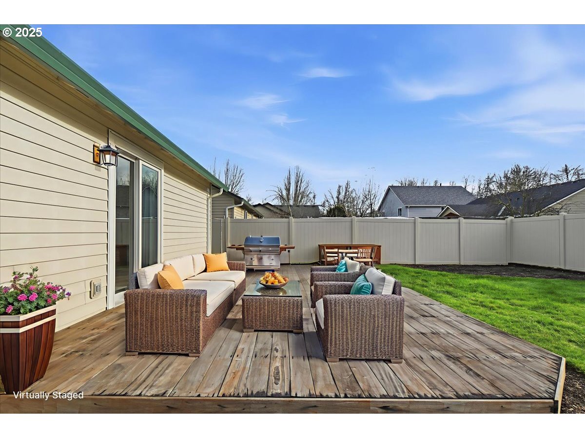 2519 Northwest 13th Street Battle Ground, WA 98604 - Photo 40 of 43 a outdoor living space with furniture and a garden