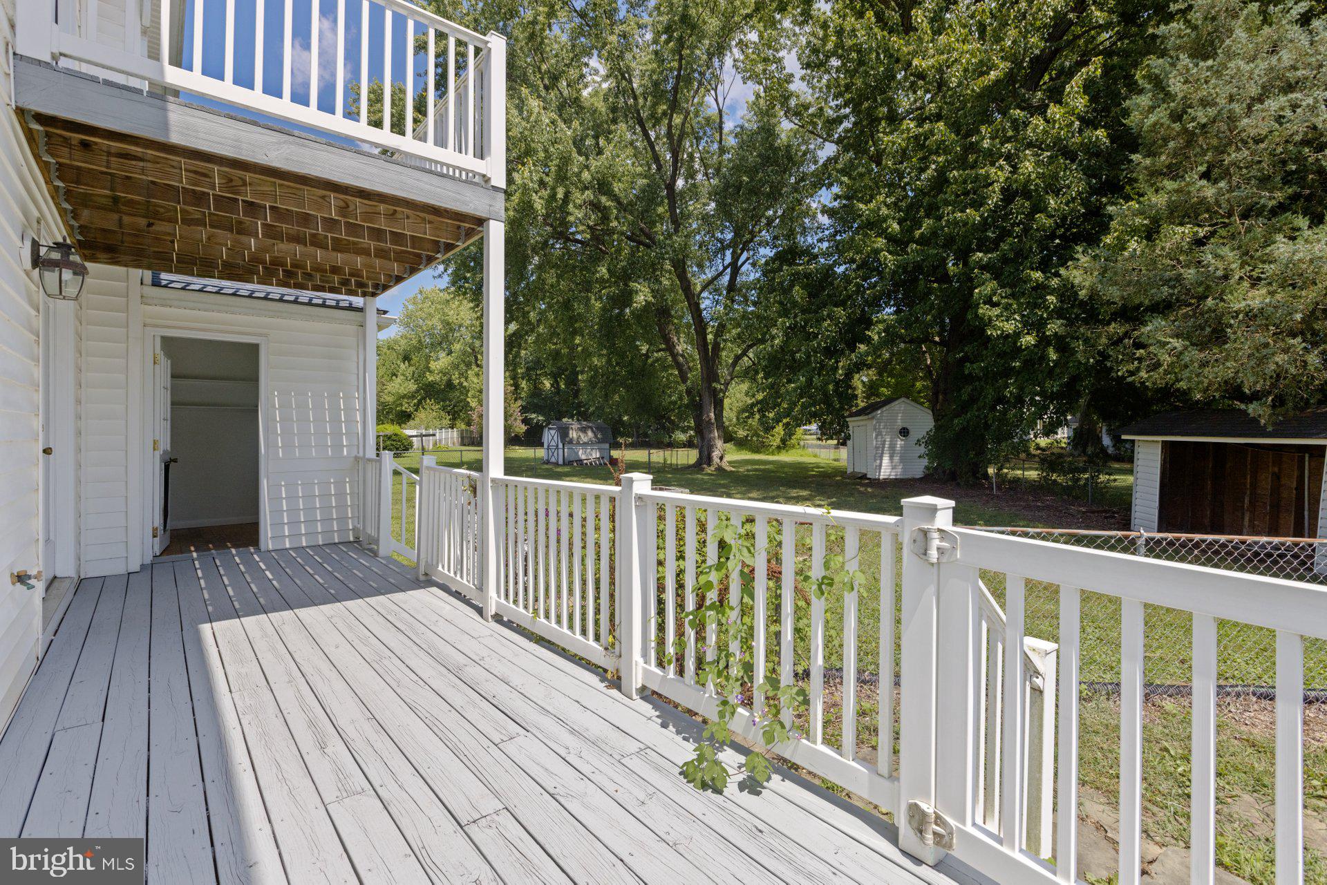 23250 Greenbrier Road Leonardtown, MD 20650 - Photo 6 of 31 Back deck overlooking the yard