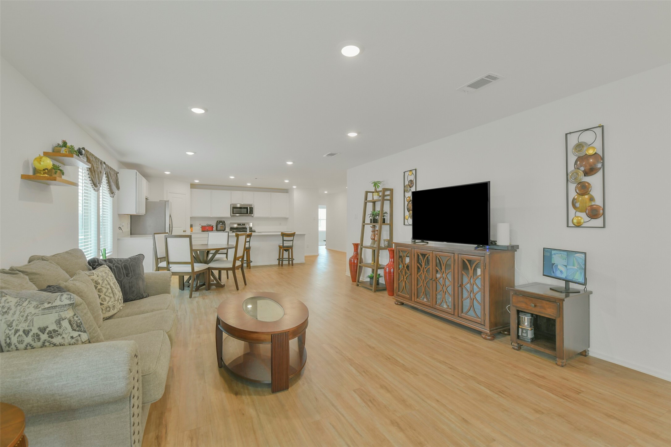 13978 Manatee Street Splendora, TX 77372 - Photo 3 of 39 Spacious family room designed for comfortable everyday living and entertaining.