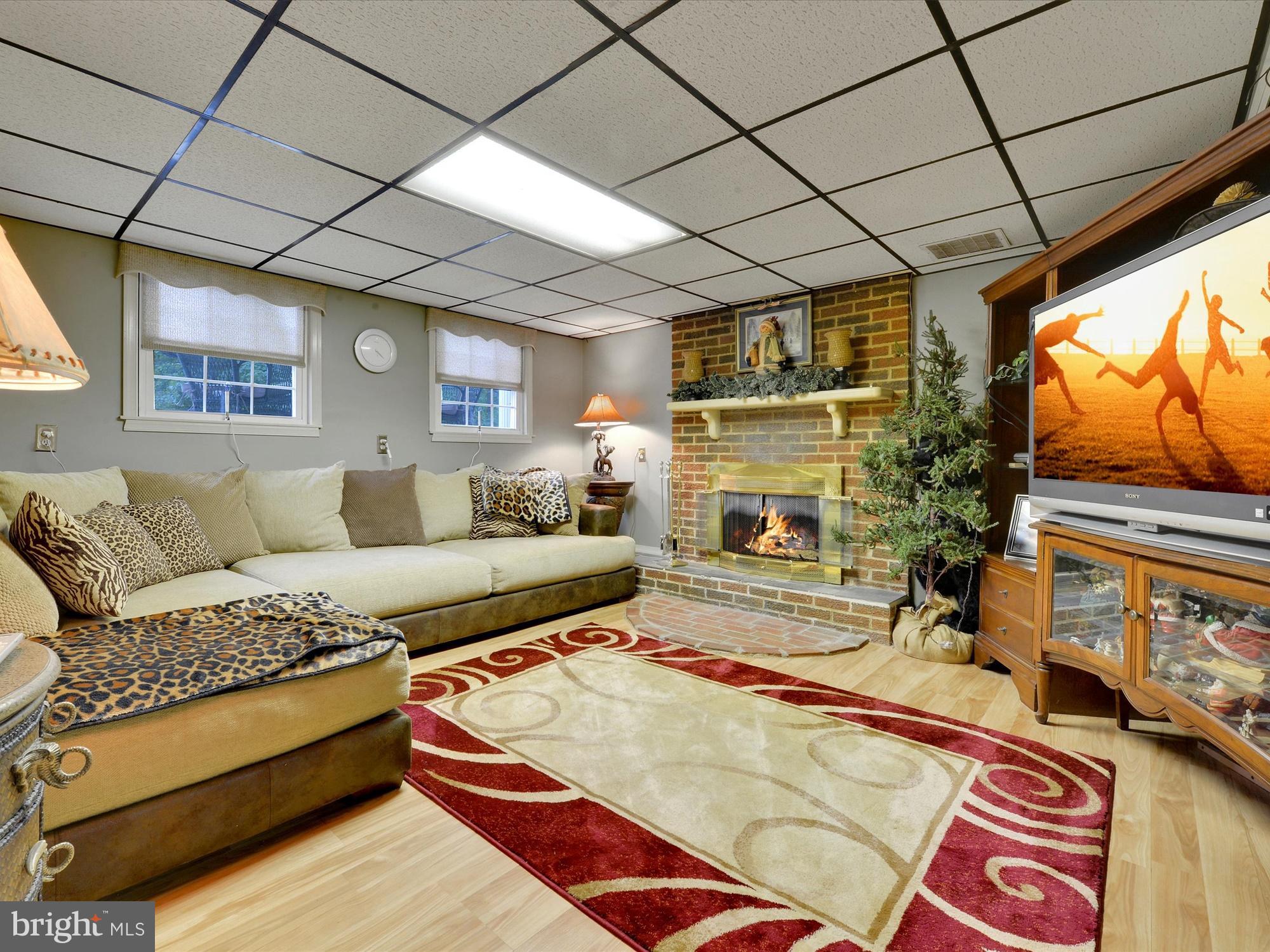 6166 Pigeon Hill Road Spring Grove, PA 17362 - Photo 17 of 25 LL Family Room w/Gas FP and Hardwood Floors