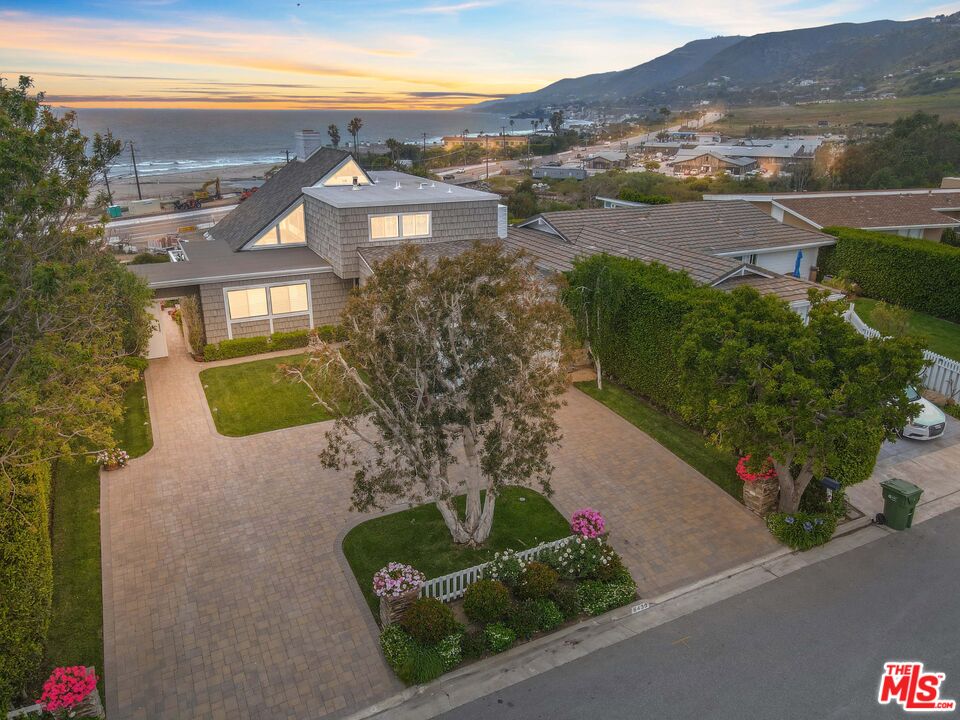 6439 Surfside Way Malibu, CA 90265 - Photo 3 of 32 an aerial view of a house with a garden
