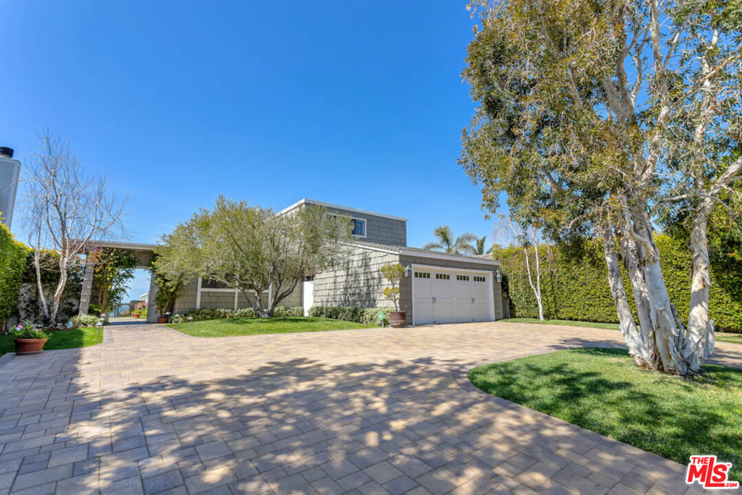 6439 Surfside Way Malibu, CA 90265 - Photo 5 of 32 a view of a house with a yard
