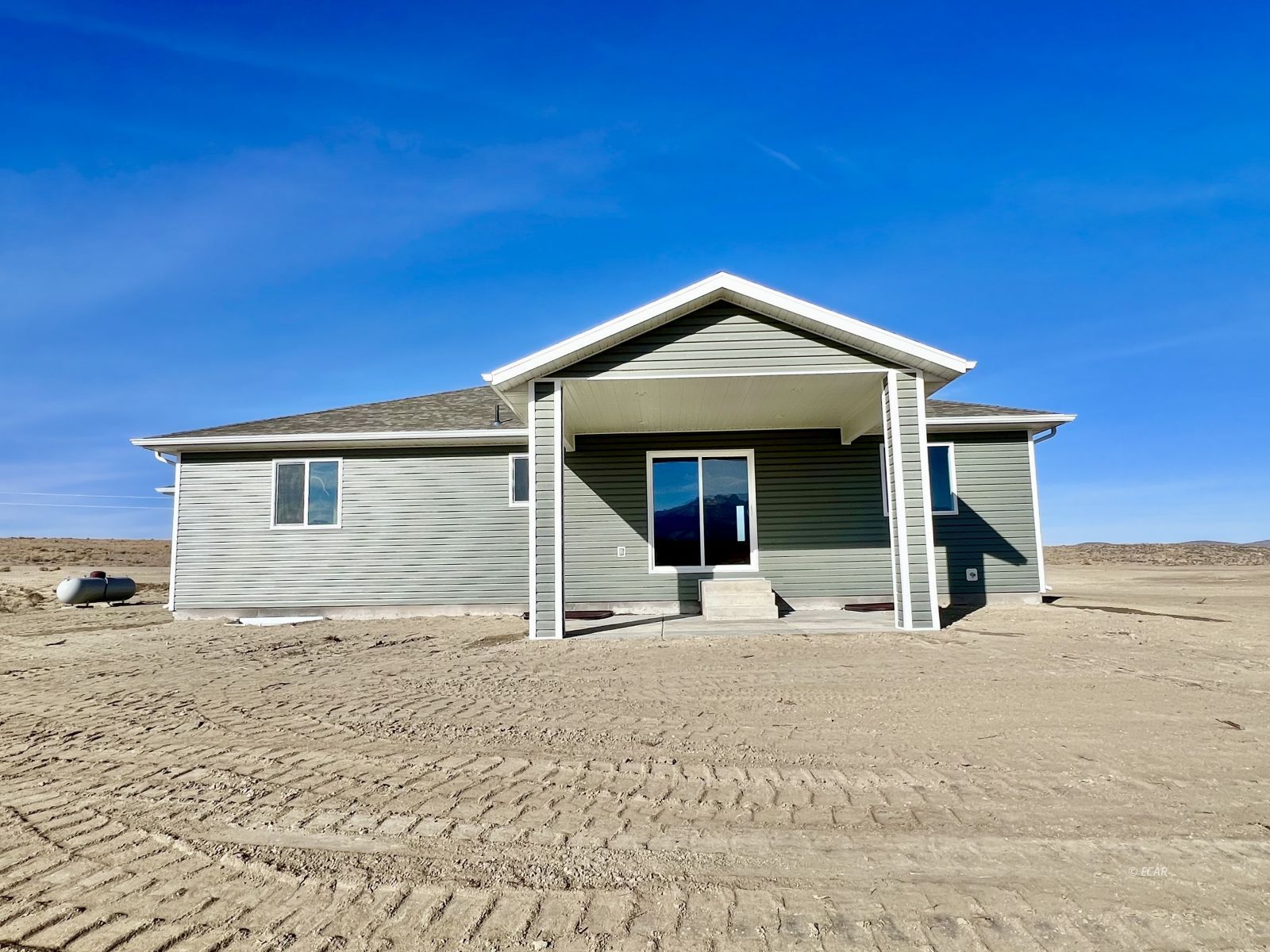 1096 Sun Vly Road Spring Creek, NV 89815 - Photo 29 of 31 a front view of a house with a yard