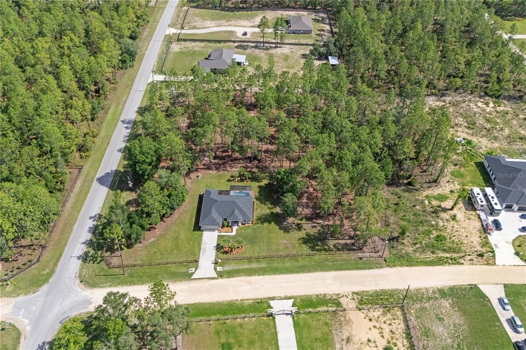 12929 Southwest 89th Street Dunnellon, FL 34432 - Photo 67 of 76 an aerial view of residential houses with outdoor space