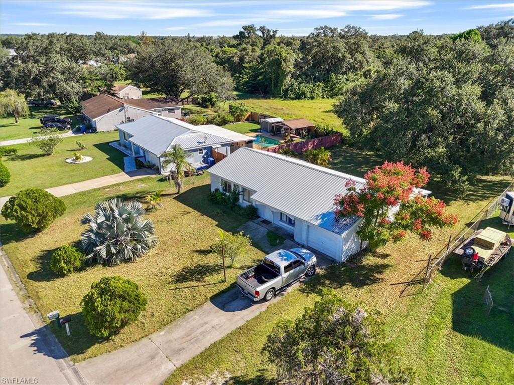 4077 South Edgewater Circle LaBelle, FL 33935 - Photo 25 of 30 an aerial view of a house with a garden