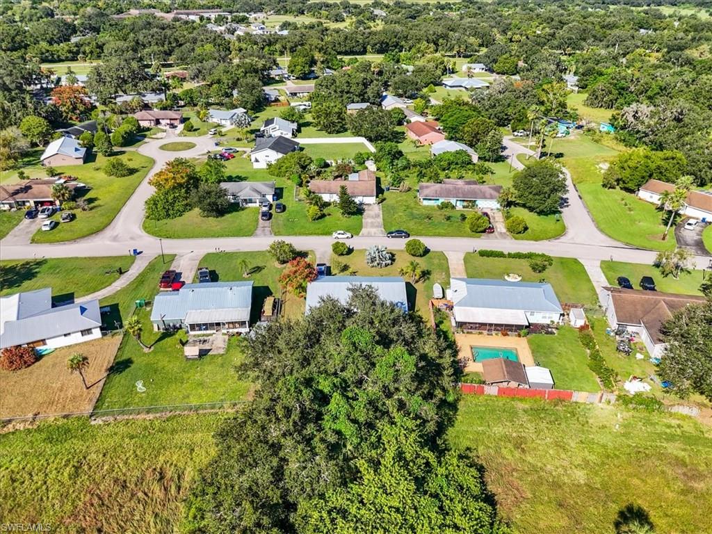 4077 South Edgewater Circle LaBelle, FL 33935 - Photo 26 of 30 an aerial view of residential houses with outdoor space and street view