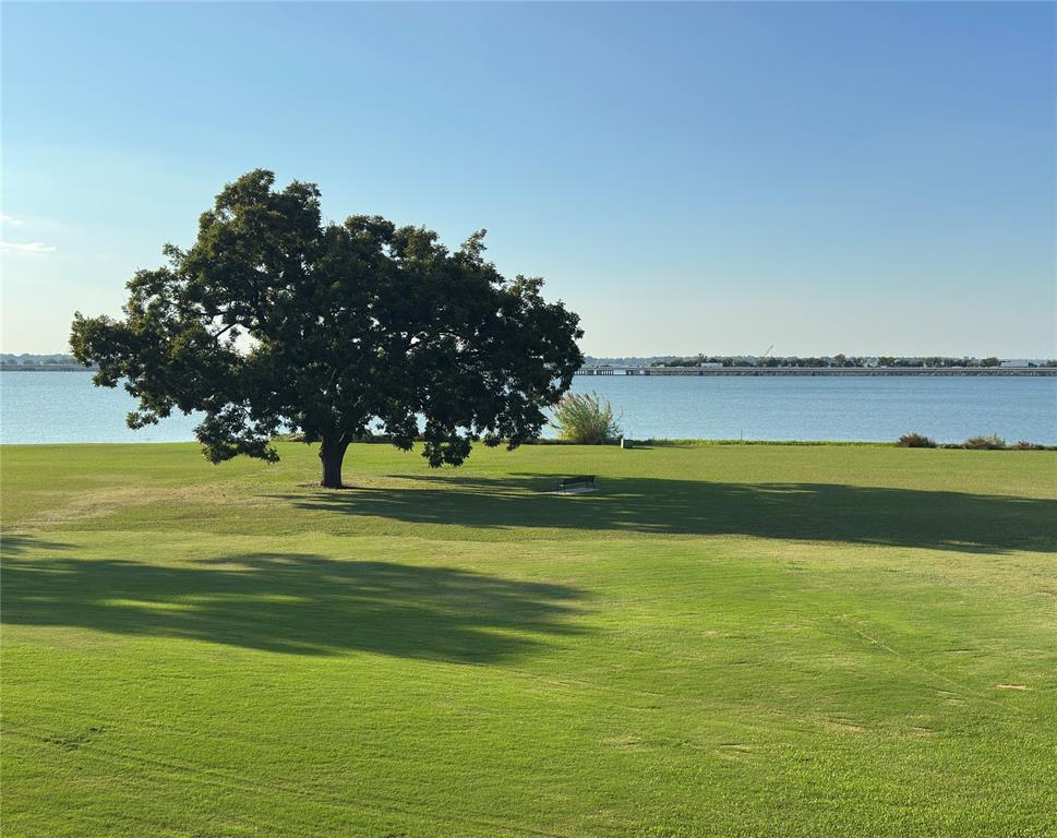 1912 Signal Ridge Place Rockwall, TX 75032 - Photo 1 of 21 a view of a swimming pool with an ocean view