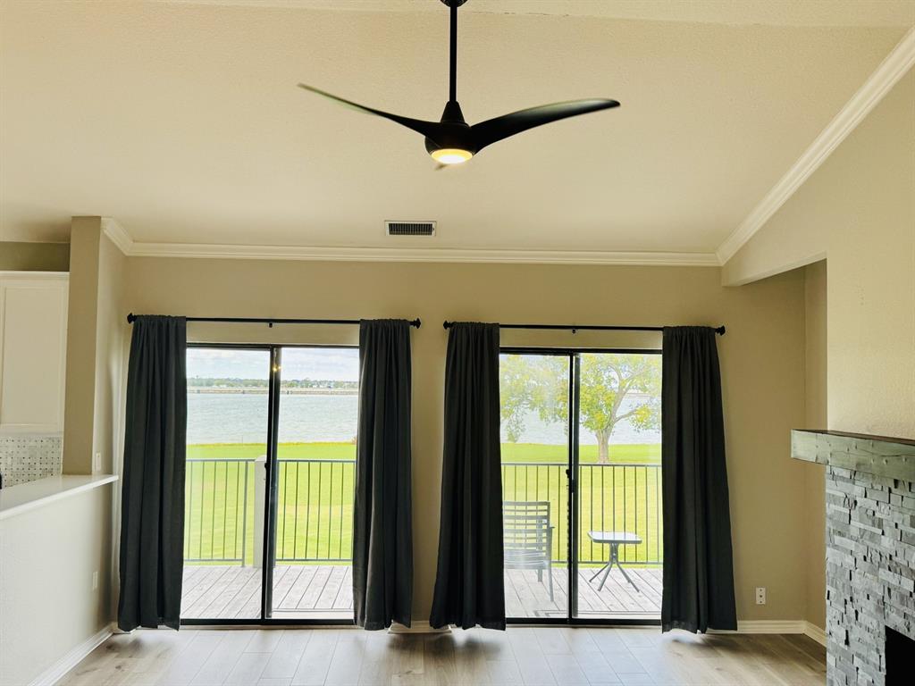 1912 Signal Ridge Place Rockwall, TX 75032 - Photo 9 of 21 a view of a room with a large window