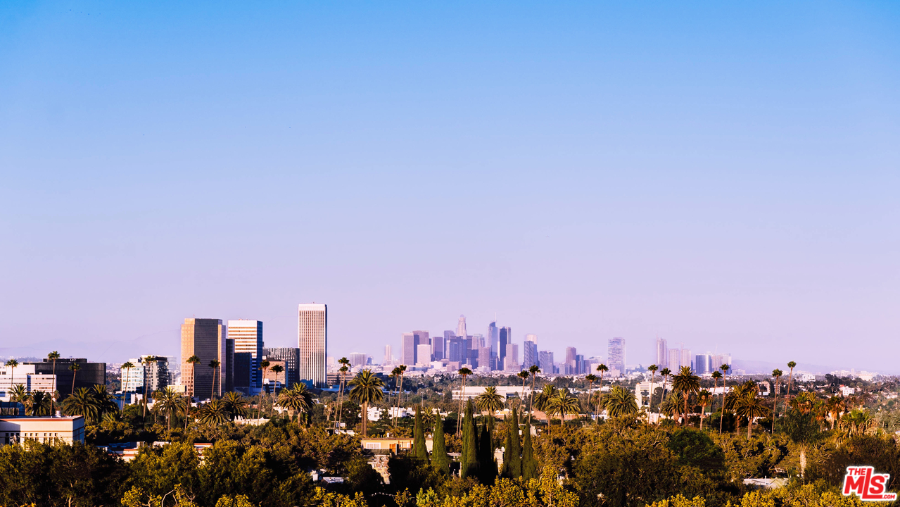 235 South Reeves Drive, Unit 301 Beverly Hills, CA 90212 - Photo 15 of 18 a view of a city with lots of trees