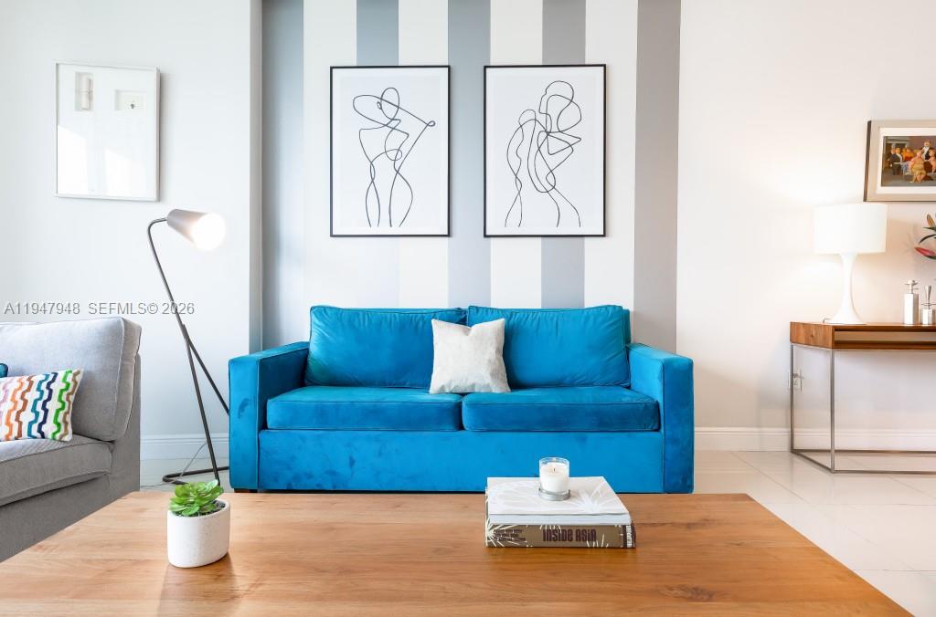 485 Brickell Avenue, Unit 4307 Miami, FL 33131 - Photo 9 of 21 a living room with furniture and wooden floor