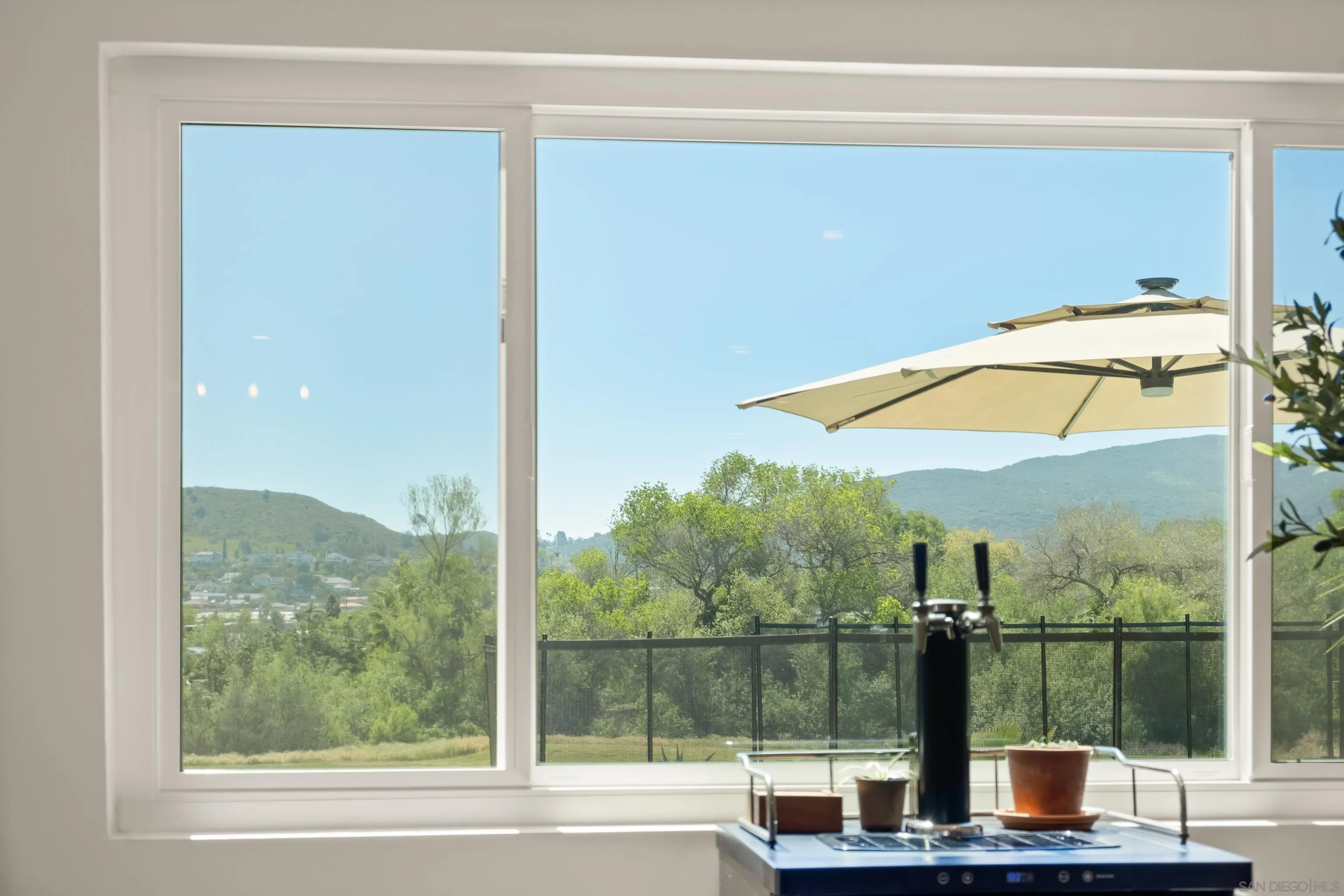 9081 Inverness Road Santee, CA 92071 - Photo 20 of 53 a view of a lake from a window
