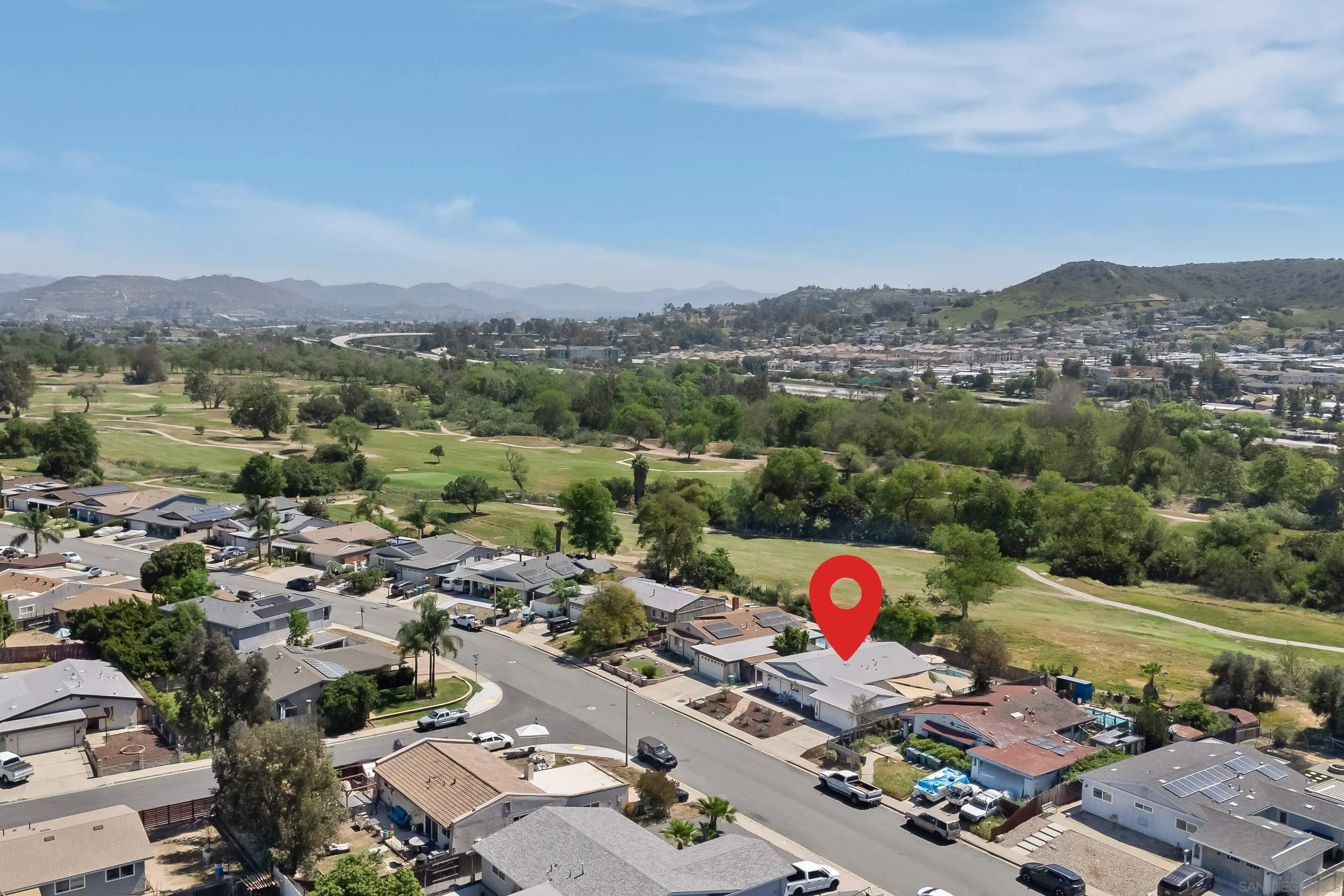 9081 Inverness Road Santee, CA 92071 - Photo 45 of 53 an aerial view of a city with lots of residential buildings