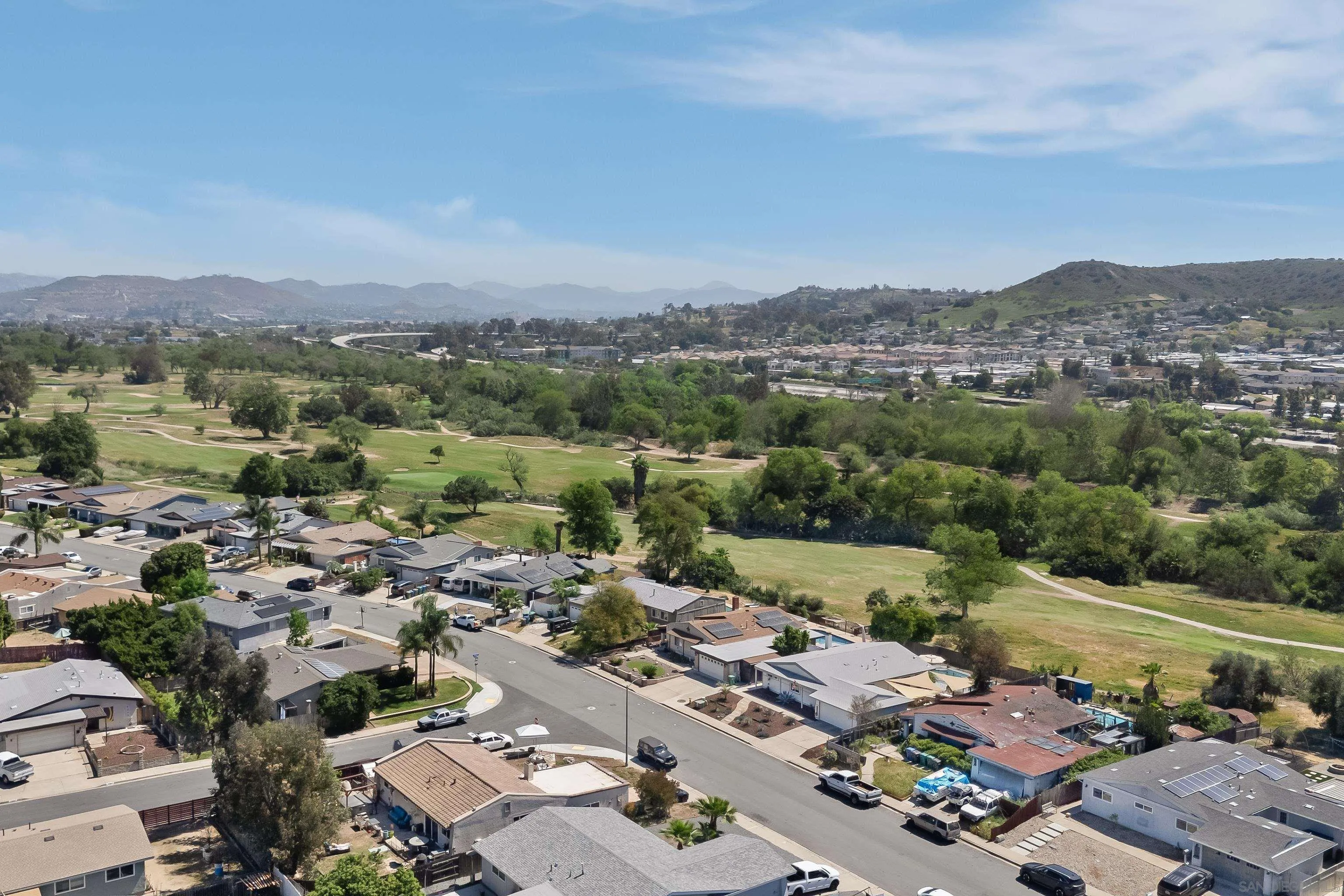 9081 Inverness Road Santee, CA 92071 - Photo 50 of 53 an aerial view of a city with lots of residential buildings