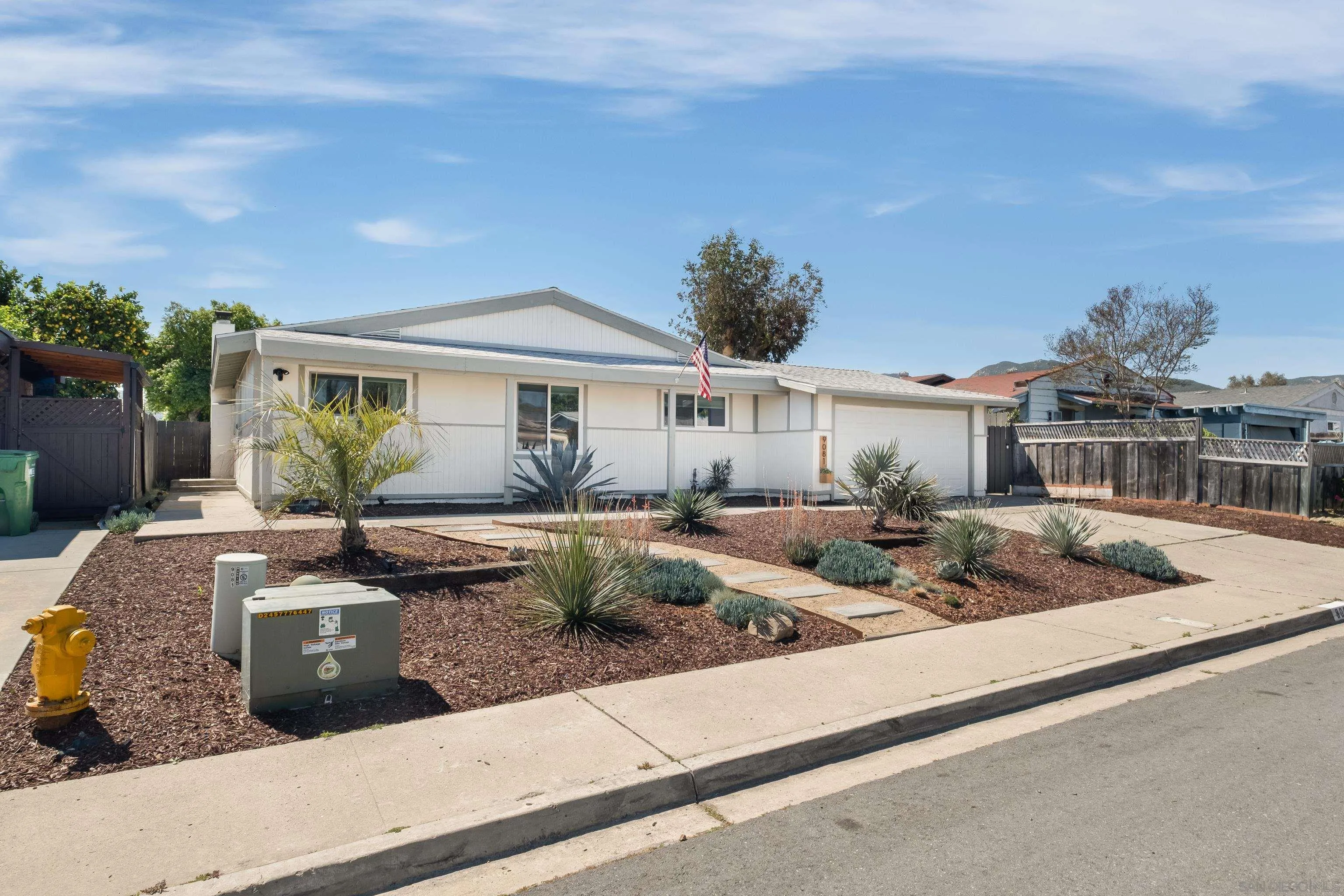 9081 Inverness Road Santee, CA 92071 - Photo 6 of 53 a view of a house with backyard