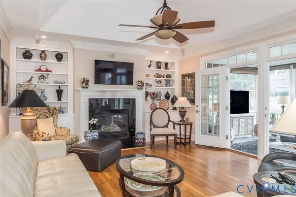 a kitchen with stainless steel appliances granite countertop wooden cabinets a sink and a stove