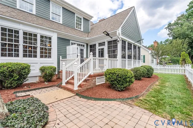 a view of a park with large trees