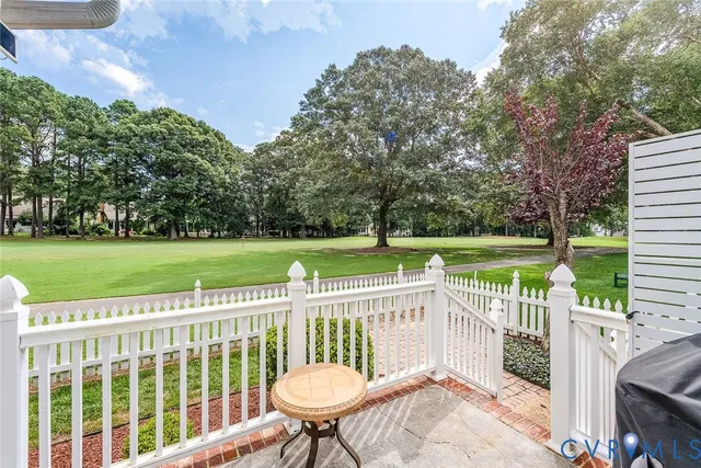 a view of porch with a bench and a window