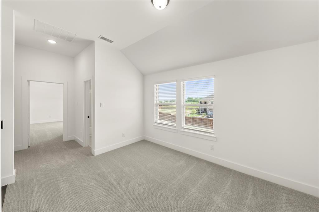 1335 Eclipse Way Wylie, TX 75098 - Photo 26 of 34 an empty room with a window