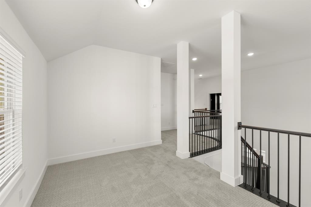 1335 Eclipse Way Wylie, TX 75098 - Photo 27 of 34 an empty room with kitchen view and appliances