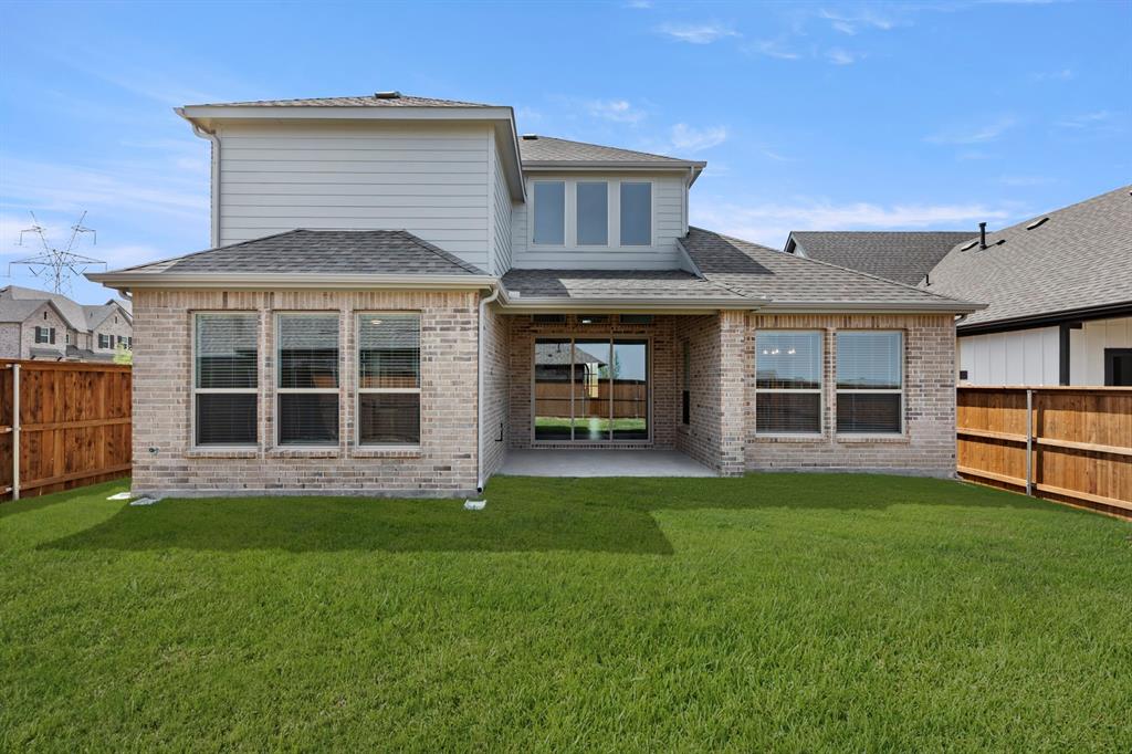 1335 Eclipse Way Wylie, TX 75098 - Photo 31 of 34 a front view of a house with a yard