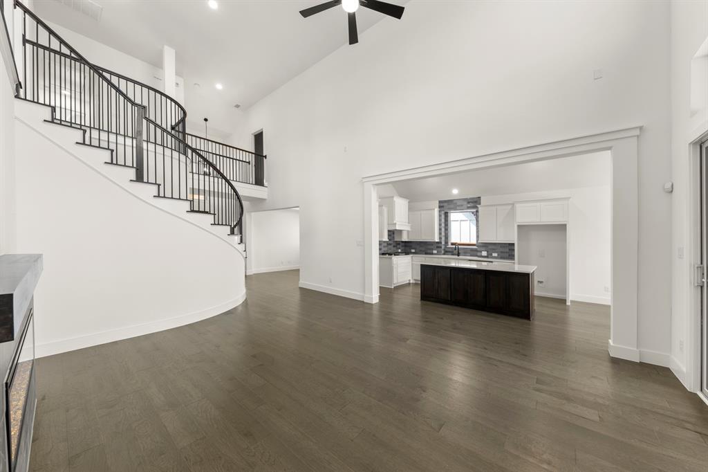 1335 Eclipse Way Wylie, TX 75098 - Photo 9 of 34 a view of kitchen and a sink with wooden floor
