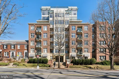 a view of a building and a street