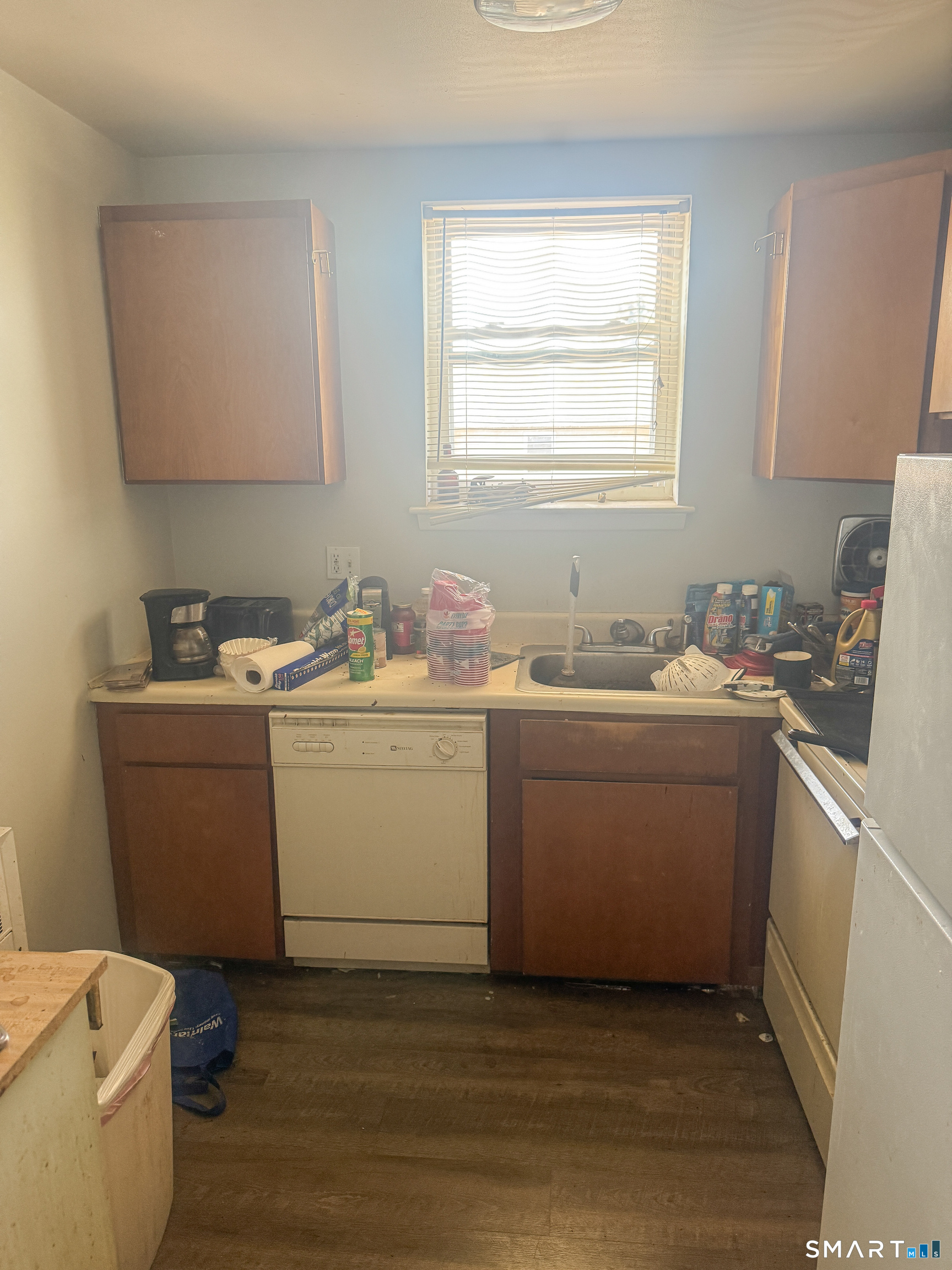 53 Wolcott Hill Road, Unit C12 Wethersfield, CT 06109 - Photo 13 of 25 a utility room with sink a washer and dryer
