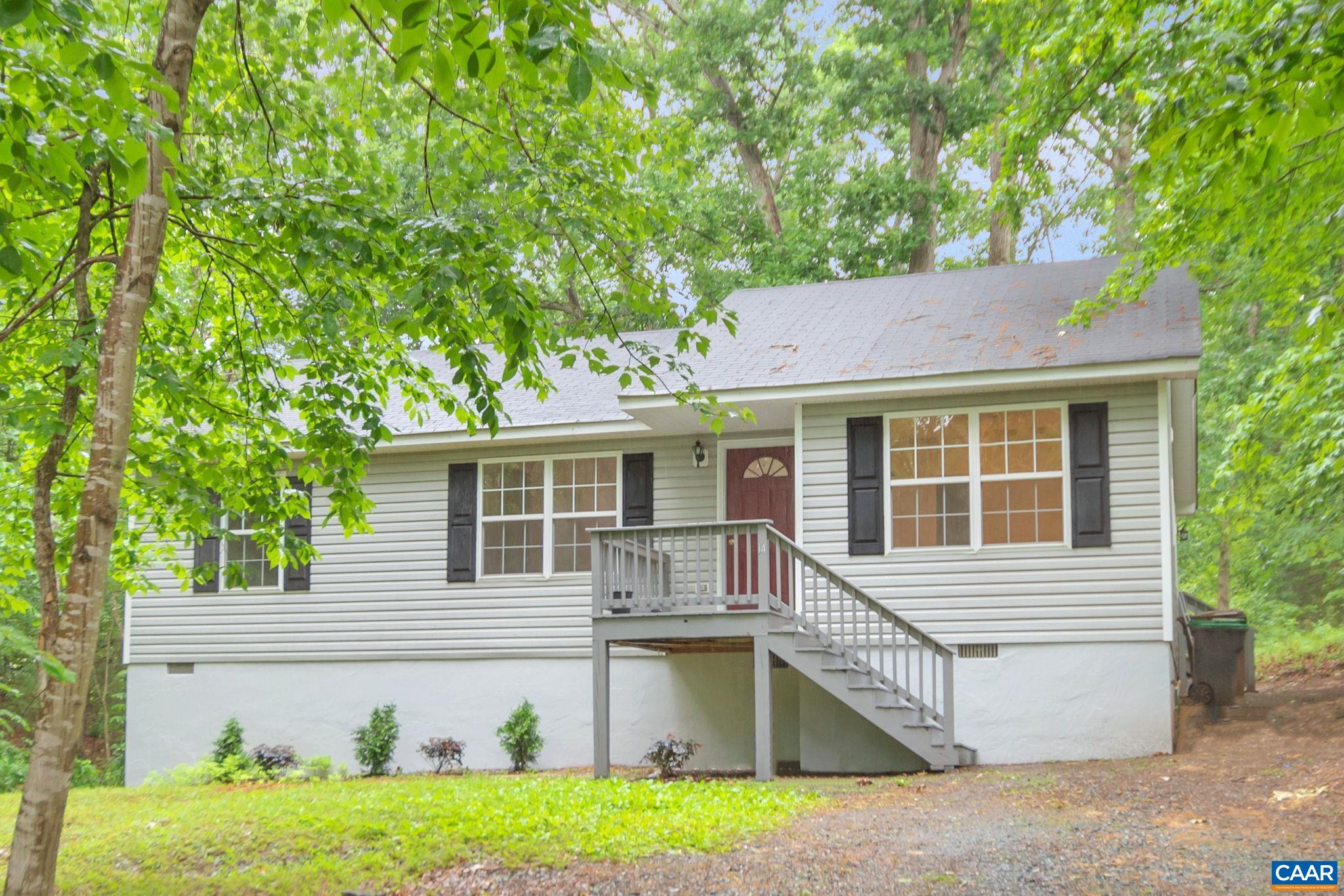 14 Hatchechubee Road Palmyra, VA 22963 - Photo 1 of 30 a front view of a house with a yard and porch