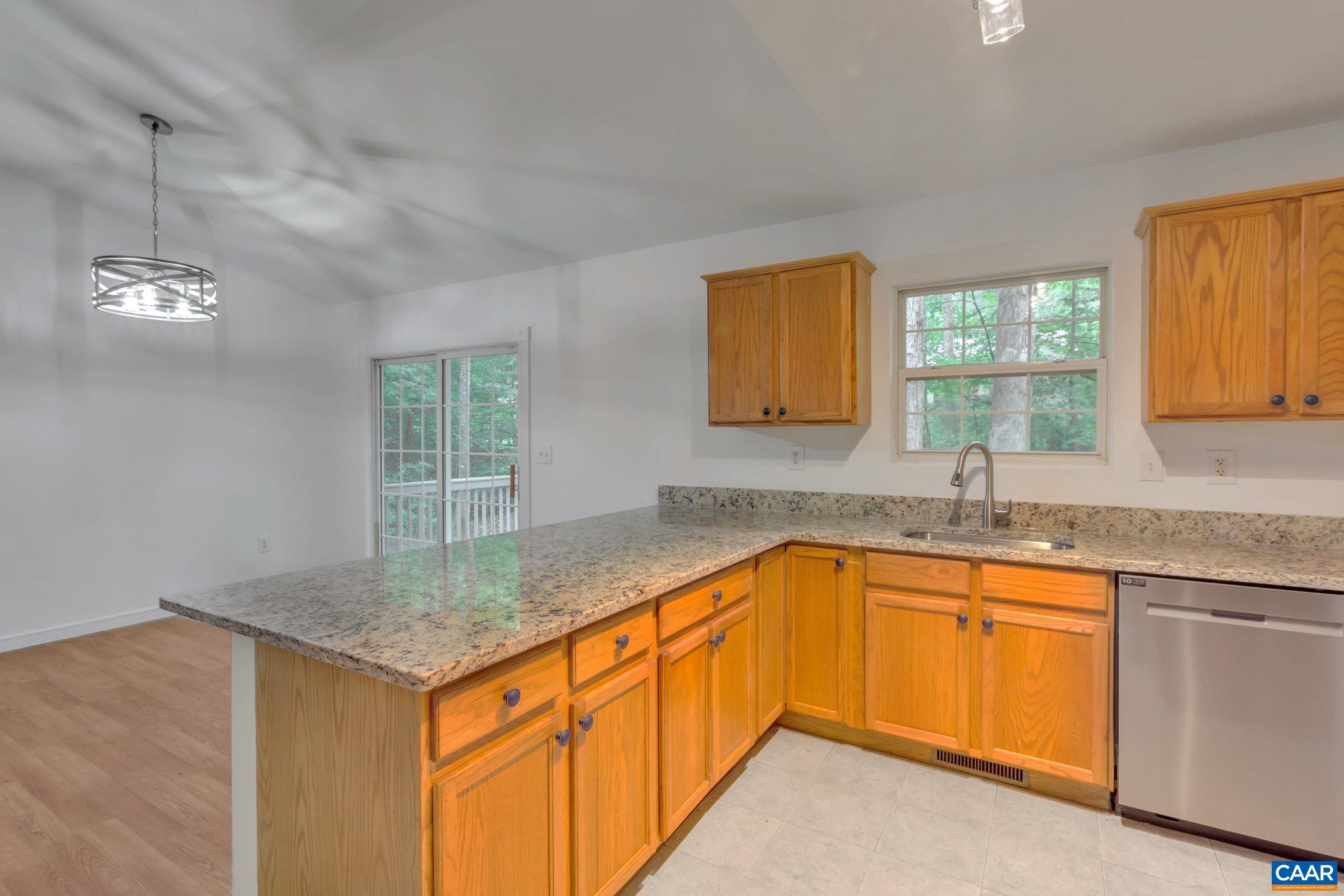14 Hatchechubee Road Palmyra, VA 22963 - Photo 13 of 30 a kitchen with a sink granite counter tops and a window