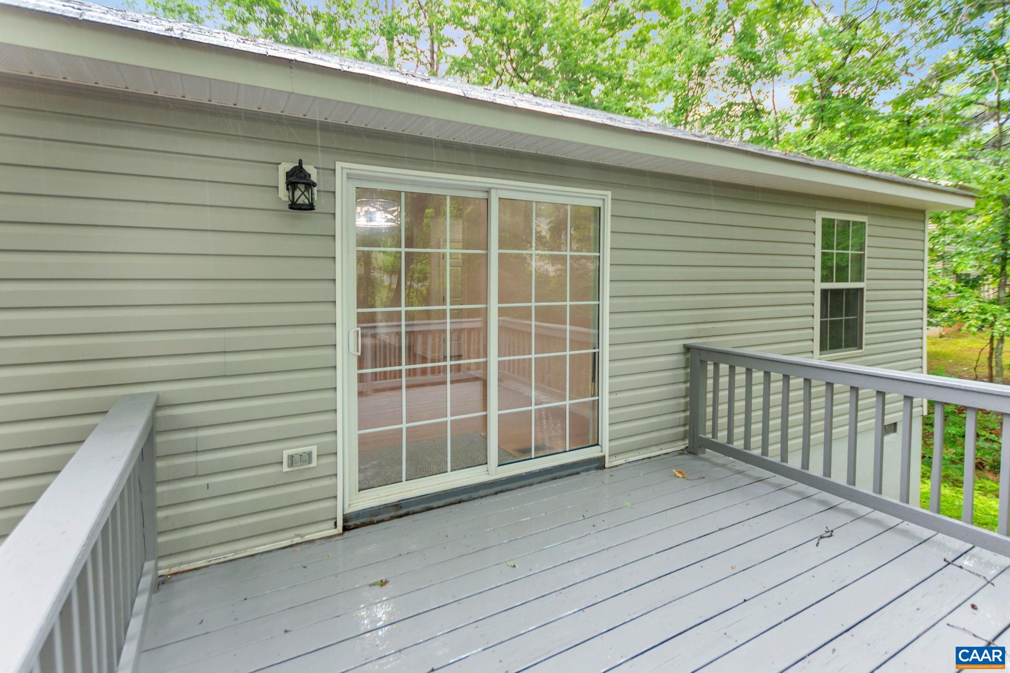 14 Hatchechubee Road Palmyra, VA 22963 - Photo 23 of 30 a view of a balcony with wooden floor