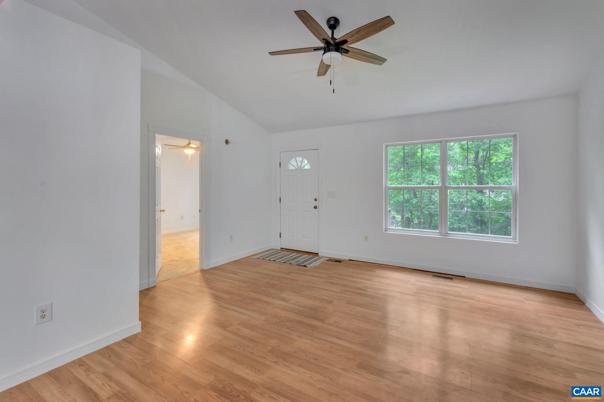 14 Hatchechubee Road Palmyra, VA 22963 - Photo 6 of 30 wooden floor in an empty room with a window