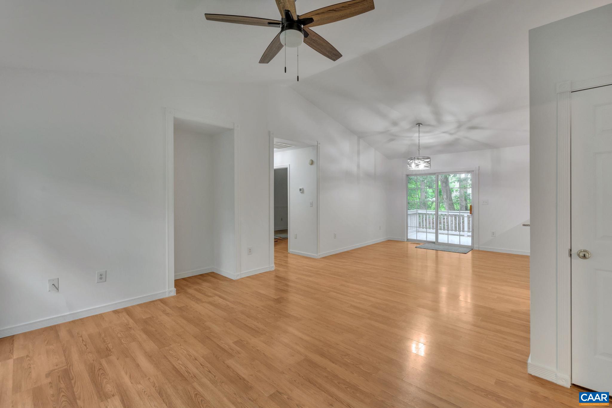 14 Hatchechubee Road Palmyra, VA 22963 - Photo 7 of 30 a view of empty room with wooden floor and fan